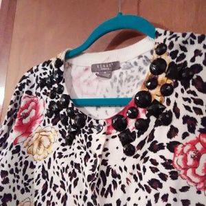 Button down sweater. With button details